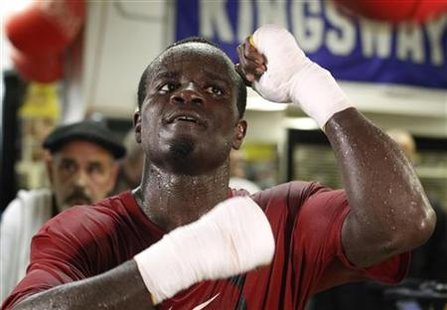 
Boxer Joshua Clottey hits the speed bag during a media workout in New York March 4, 2010. REUTERS/Shannon Stapleton
