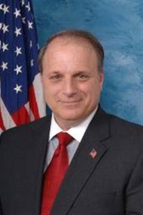 
Democratic Representative Eric Massa poses in this 2009 official photo. Massa announced his resignation on March 5, 2010, saying an ethics investigation into alleged misconduct toward a male staff member would tear his family and staff apart. REUTERS/massa.house.gov/Handout
