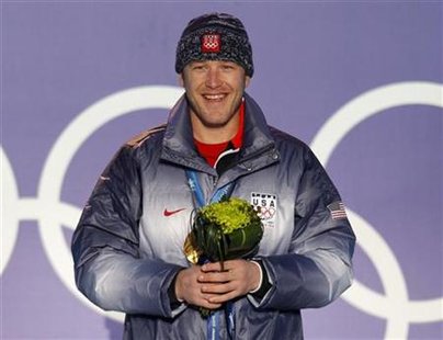 
Gold medallist Bode Miller of the U.S. stands on the podium during the medal ceremony for the men's super combined alpine skiing event during the Vancouver 2010 Winter Olympics at Whistler, British Columbia February 21, 2010. REUTERS/Mike Segar

