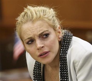 Actress Lindsay Lohan attends a progress report hearing for her 2007 drunk driving case at a courthouse in Beverly Hills, California October 16, 2009 file photo. REUTERS/Nick Ut/Pool
Actress Lindsay Lohan attends a progress report hearing for her 2007 drunk driving case at a courthouse in Beverly Hills, California October 16, 2009 file photo. REUTERS/Nick Ut/Pool