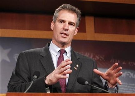 
Republican Massachusetts Senator Scott Brown speaks after his ceremonial swearing-in at the U.S. Capitol in Washington February 4, 2010. REUTERS/Kevin Lamarque
