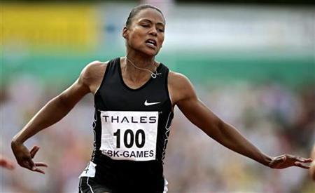 
U.S. sprinter Marion Jones competes in the women's 100 metre dash at the FBK Games in Hengelo, in the Netherlands in this May 29, 2005 file photo. REUTERS/Jerry Lampen/Files
