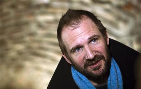 
Actor Ralph Fiennes smiles during an interview with Reuters in Belgrade March 10, 2010. After two years struggling to win funding amid the global financial crisis, Fiennes said on Wednesday he would start filming his directorial debut of a Shakespeare tragedy "Coriolanus" next week in Serbia. REUTERS/Marko Djurica

