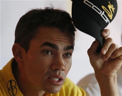 
Colombian golf player Camilo Villegas gestures during a news conference in Bogota March 2, 2010. REUTERS/John Vizcaino

