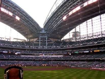 The inside of Miller Park from behind the outfield wall in center field.