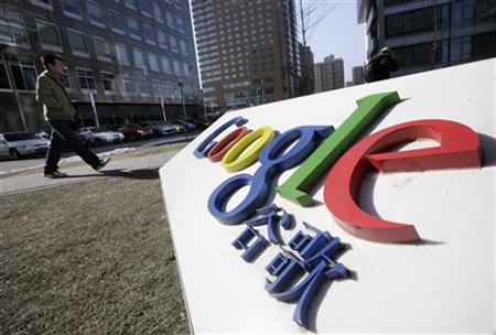 
A man walks past a logo of Google China in front of its headquarters in Beijing January 22, 2010. REUTERS/Jason Lee
