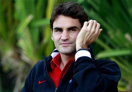 
Roger Federer of Switzerland attends a round-table session prior to the start of the ATP Dubai Tennis Championships in this February 21, 2010 file photo. REUTERS/Mosab Omar
