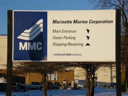 A sign outside Marinette Marine's production facility in Marinette.