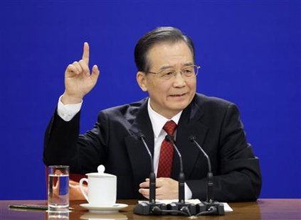 
China's Premier Wen Jiabao gestures during his annual news conference following the closing session of the National People's Congress at the Great Hall of the People in Beijing March 14, 2010. REUTERS/Jason Lee
