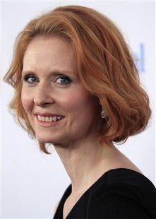 
Actress Cynthia Nixon poses for photographers as she arrives at the 21st Annual GLAAD Media Awards in New York City March 13, 2010. REUTERS/Jessica Rinaldi
