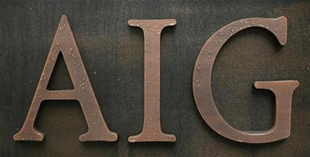 
Raindrops are seen on an AIG logo at the AIG Building in Tokyo February 27, 2009. REUTERS/Michael Caronna
