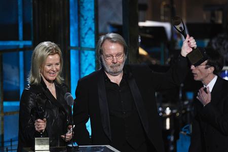 
Piano player Benny Andersson (C) and Anni-Frid Lyngstad of ABBA celebrate after being inducted during the 2010 Rock and Roll Hall of Fame induction ceremony at the Waldorf Astoria Hotel in New York, March 15, 2010. REUTERS/Lucas Jackson
