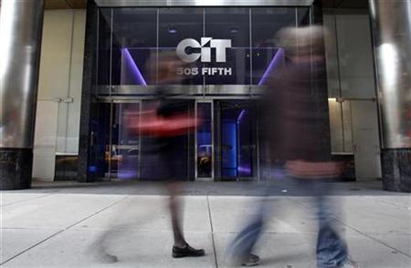 
People walk past the headquarters of CIT Group in New York October 31, 2009. REUTERS/Natalie Behring
