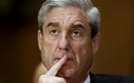 
FBI Director Robert Mueller listens to opening statements before testifying at a Senate Homeland Security and Government Affairs hearing on Capitol Hill in Washington in this September 30, 2009 file photo. REUTERS/Molly Riley
