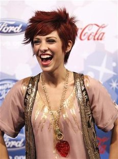 
Performer Lacey Brown poses at the party for the 12 finalists of the television show "American Idol" in Los Angeles March 11, 2010. REUTERS/Mario Anzuoni
