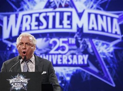 
WWE Hall of Fame Wrestler Ric "Nature Boy" Flair speaks during a press conference for the 25th Anniversary of WrestleMania in New York March 31, 2009. REUTERS/Brendan McDermid

