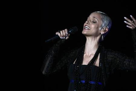 
Portuguese Fado singer Mariza performs during the annual Conde Duque concert in Madrid July 13, 2008. REUTERS/Juan Medina
