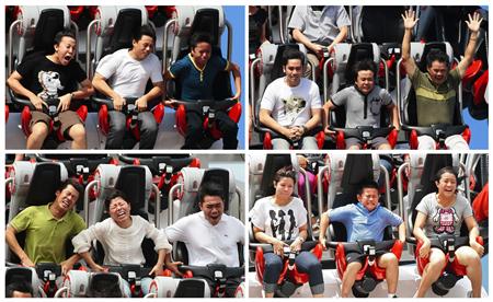 
A combination of four photos shows visitors reacting as they ride the "Battlestar Galactica" duelling roller coaster at the Universal Studios theme park in Singapore March 18, 2010. REUTERS/Vivek Prakash
