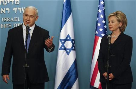 
Israel's Prime Minister Benjamin Netanyahu (L) speaks during a joint news conference with USecretary of State Hillary Clinton before their meeting in Jerusalem in this October 31, 2009 file photo. REUTERS/Dan Balilty/Pool
