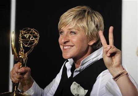 




Ellen Degeneres poses with her award for Outstanding Talk Show Host at the 35th Annual Daytime Emmy Awards at the Kodak theatre in Hollywood, California June 20, 2008. REUTERS/Phil McCarten

