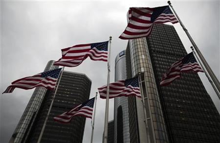 
Flags wave in front of the General Motors Corp world headquarters in downtown in Detroit in this May 28, 2009 file photo. REUTERS/Mark Blinch
