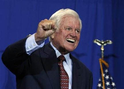 
Senator Ted Kennedy (D-MA) reacts after President Barack Obama signed H.R. 1388, the Edward M. Kennedy Serve America Act, at the SEED Public Charter School in Washington, April 21, 2009. REUTERS/Jason Reed
