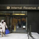 A man walks out of an Internal Revenue Services office after filing his taxes on Tax Day in New York, April 15, 2009. REUTERS/Lucas Jackson
A man walks out of an Internal Revenue Services office after filing his taxes on Tax Day in New York, April 15, 2009. REUTERS/Lucas Jackson