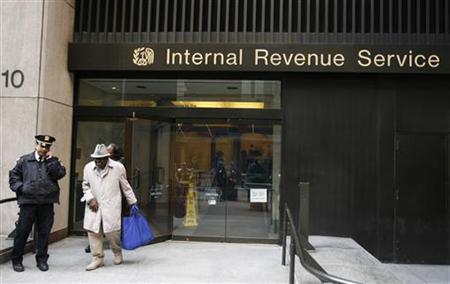 A man walks out of an Internal Revenue Services office after filing his taxes on Tax Day in New York, April 15, 2009. REUTERS/Lucas Jackson
A man walks out of an Internal Revenue Services office after filing his taxes on Tax Day in New York, April 15, 2009. REUTERS/Lucas Jackson