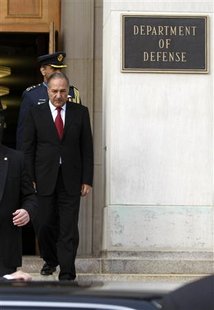 
Pakistan's Defense Minister Chaudhry Ahmed Mukhtar departs the Pentagon after visiting with U.S. Defense Secretary Robert Gates in Washington March 25, 2010. REUTERS/Hyungwon Kang
