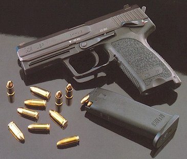 Handgun and ammunition. Handgun and ammunition.