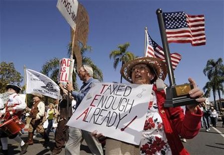 Anita Dwyer participates in a rally and march in protest of higher taxes in Santa Barbara, California, in this April 4, 2009 file photo. REUTERS/Phil McCarten/Files
Anita Dwyer participates in a rally and march in protest of higher taxes in Santa Barbara, California, in this April 4, 2009 file photo. REUTERS/Phil McCarten/Files