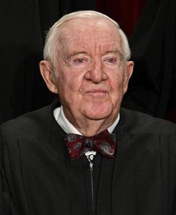 Supreme Court Justice John Paul Stevens poses for an official photograph with the other Justices at the Supreme Court in Washington, September 29, 2009. REUTERS/Jim Young
Supreme Court Justice John Paul Stevens poses for an official photograph with the other Justices at the Supreme Court in Washington, September 29, 2009. REUTERS/Jim Young
