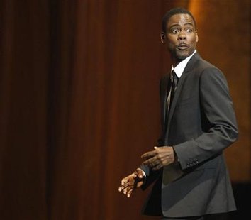 Actor Chris Rock walks on stage to accept the award for Outstanding Documentary at the 41st Annual NAACP Image Awards at the Shrine auditorium in Los Angeles February 26, 2010. REUTERS/Mario Anzuoni
Actor Chris Rock walks on stage to accept the award for Outstanding Documentary at the 41st Annual NAACP Image Awards at the Shrine auditorium in Los Angeles February 26, 2010. REUTERS/Mario Anzuoni