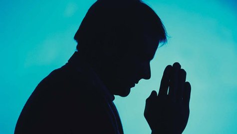 Image of a man praying. Image of a man praying.