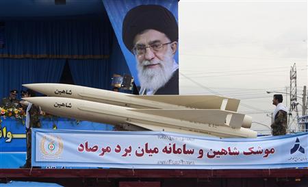 EDITORS' NOTE: Reuters and other foreign media are subject to Iranian restrictions on leaving the office to report, film or take pictures in Tehran. A military vehicle carrying the Shaheen missile, part of Iran's medium range anti-aircraft air defence system Mersad (Ambush), drives past a picture of Iran's Supreme Leader Ayatollah Ali Khamenei during a parade to commemorate the anniversary of army day in Tehran April 18, 2010. REUTERS/Morteza Ni
EDITORS' NOTE: Reuters and other foreign media are subject to Iranian restrictions on leaving the office to report, film or take pictures in Tehran. A military vehicle carrying the Shaheen missile, part of Iran's medium range anti-aircraft air defence system Mersad (Ambush), drives past a picture of Iran's Supreme Leader Ayatollah Ali Khamenei during a parade to commemorate the anniversary of army day in Tehran April 18, 2010. REUTERS/Morteza Ni