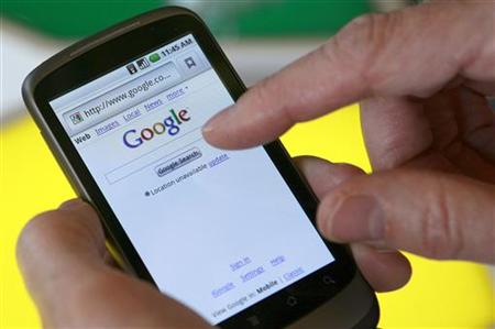 A model demonstrates a Nexus One smartphone, the first mobile phone Google will sell directly to consumers based on its Android platform, after a news conference at Google headquarters in Mountain View, California January 5, 2010. REUTERS/Robert Galbraith
A model demonstrates a Nexus One smartphone, the first mobile phone Google will sell directly to consumers based on its Android platform, after a news conference at Google headquarters in Mountain View, California January 5, 2010. REUTERS/Robert Galbraith