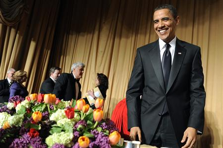 President Barack Obama (R) takes his seat after an awards ceremony at the White House Correspondents' Association Dinner in Washington, May 1, 2010. REUTERS/Jonathan Ernst
President Barack Obama (R) takes his seat after an awards ceremony at the White House Correspondents' Association Dinner in Washington, May 1, 2010. REUTERS/Jonathan Ernst