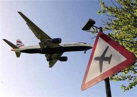 
A British Airways jet lands at Heathrow airport in west London April 21, 2010. REUTERS/Toby Melville
