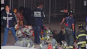 Emergency personnel attend to people injured in Saturday's Staten Island Ferry crash in New York. (Courtesy of CNN). Emergency personnel attend to people injured in Saturday's Staten Island Ferry crash in New York. (Courtesy of CNN).