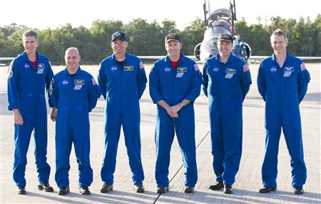 Space Shuttle Atlantis STS-132's crew (from L-R), mission specialists Michael Good, Garrett Reisman, pilot Dominic Antonelli, commander Kenneth Ham, mission specialists Stephen Bowen and Piers Sellers pose for a group photo after arriving at the Kennedy Space Center in Cape Canaveral, Florida May 10, 2010. REUTERS/Scott Audette
Space Shuttle Atlantis STS-132's crew (from L-R), mission specialists Michael Good, Garrett Reisman, pilot Dominic Antonelli, commander Kenneth Ham, mission specialists Stephen Bowen and Piers Sellers pose for a group photo after arriving at the Kennedy Space Center in Cape Canaveral, Florida May 10, 2010. REUTERS/Scott Audette