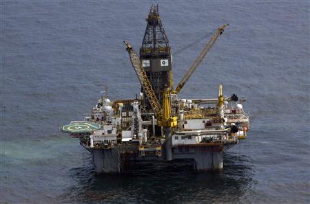 The Transocean Development Driller III, which is drilling the relief well, is seen surrounded by part of the oil slick covering the site of the BP oil spill in the Gulf of Mexico, off the coast of Louisiana May 12, 2010. REUTERS/Rick Wilking
The Transocean Development Driller III, which is drilling the relief well, is seen surrounded by part of the oil slick covering the site of the BP oil spill in the Gulf of Mexico, off the coast of Louisiana May 12, 2010. REUTERS/Rick Wilking