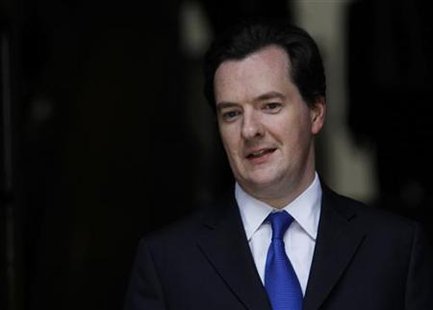 
Britain's new Chancellor of the Exchequer George Osborne walks out of Treasury in Westminster, central London, May 12, 2010. REUTERS/Andrew Winning
