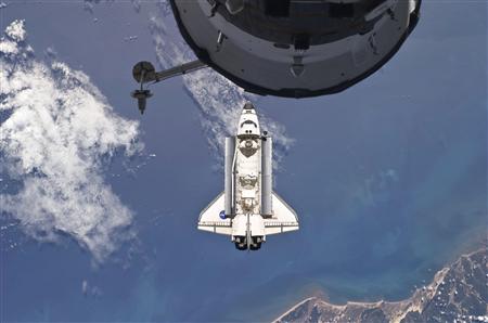 The Space Shuttle Atlantis is backdropped against the Earth prior to docking with the International Space Station, with a portion of a docked Russian spacecraft in the foreground in this photo released by NASA and taken May 16, 2010. Picture taken May 16, 2010. REUTERS/NASA Handout
The Space Shuttle Atlantis is backdropped against the Earth prior to docking with the International Space Station, with a portion of a docked Russian spacecraft in the foreground in this photo released by NASA and taken May 16, 2010. Picture taken May 16, 2010. REUTERS/NASA Handout
