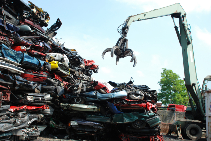 Crushed cars in a scrapyard. Crushed cars in a scrapyard.