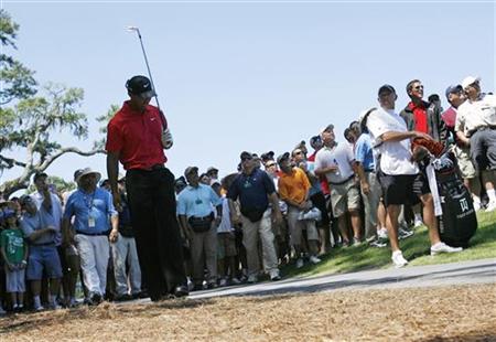 Tiger Woods of the U.S. reacts after his second shot on the seventh hole during final round play of the Tournament Players Championship PGA golf tournament at TPC Sawgrass in Ponte Vedra Beach, Florida in this May 9, 2010 file photo. REUTERS/Hans Deryk
Tiger Woods of the U.S. reacts after his second shot on the seventh hole during final round play of the Tournament Players Championship PGA golf tournament at TPC Sawgrass in Ponte Vedra Beach, Florida in this May 9, 2010 file photo. REUTERS/Hans Deryk