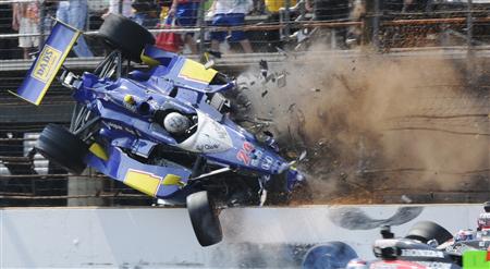 Dreyer & Reinbold Racing driver Mike Conway flies through the air after crashing with Andretti Autosport driver Ryan Hunter-Reay (R) during the 94th running of the Indianapolis 500 auto race in Indianapolis, Indiana May 30, 2010. REUTERS/Larry Papke
Dreyer & Reinbold Racing driver Mike Conway flies through the air after crashing with Andretti Autosport driver Ryan Hunter-Reay (R) during the 94th running of the Indianapolis 500 auto race in Indianapolis, Indiana May 30, 2010. REUTERS/Larry Papke