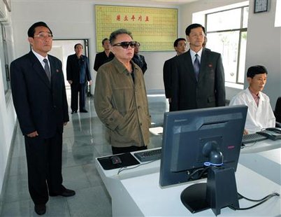 North Korean leader Kim Jong-il (C) visits the Namheung Youth Chemistry Combination Company at an undisclosed place in North Korea in this undated picture released by North Korea's official news agency KCNA June 7, 2010. KCNA did not state when the picture was taken. North Korea's parliament meets for a rare second annual session on Monday amid growing momentum in the international community to punish Pyongyang for the sinking of a South Korean
North Korean leader Kim Jong-il (C) visits the Namheung Youth Chemistry Combination Company at an undisclosed place in North Korea in this undated picture released by North Korea's official news agency KCNA June 7, 2010. KCNA did not state when the picture was taken. North Korea's parliament meets for a rare second annual session on Monday amid growing momentum in the international community to punish Pyongyang for the sinking of a South Korean