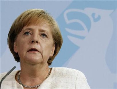 German Chancellor Angela Merkel makes a statement during a news conference at the Chancellery in Berlin June 9, 2010. REUTERS/Tobias Schwarz
German Chancellor Angela Merkel makes a statement during a news conference at the Chancellery in Berlin June 9, 2010. REUTERS/Tobias Schwarz