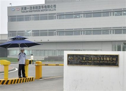 A security guard stands near the gate of Tianjin Faw Toyota Motor Co. Ltd in Tianjin municipality, June 17, 2010. REUTERS/Vincent Du
A security guard stands near the gate of Tianjin Faw Toyota Motor Co. Ltd in Tianjin municipality, June 17, 2010. REUTERS/Vincent Du