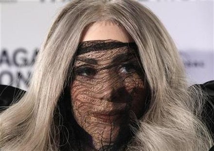 U.S. singer Lady Gaga poses after receiving four platinum record awards and three ECHO awards in Berlin, May 11, 2010. REUTERS/Tobias Schwarz
U.S. singer Lady Gaga poses after receiving four platinum record awards and three ECHO awards in Berlin, May 11, 2010. REUTERS/Tobias Schwarz